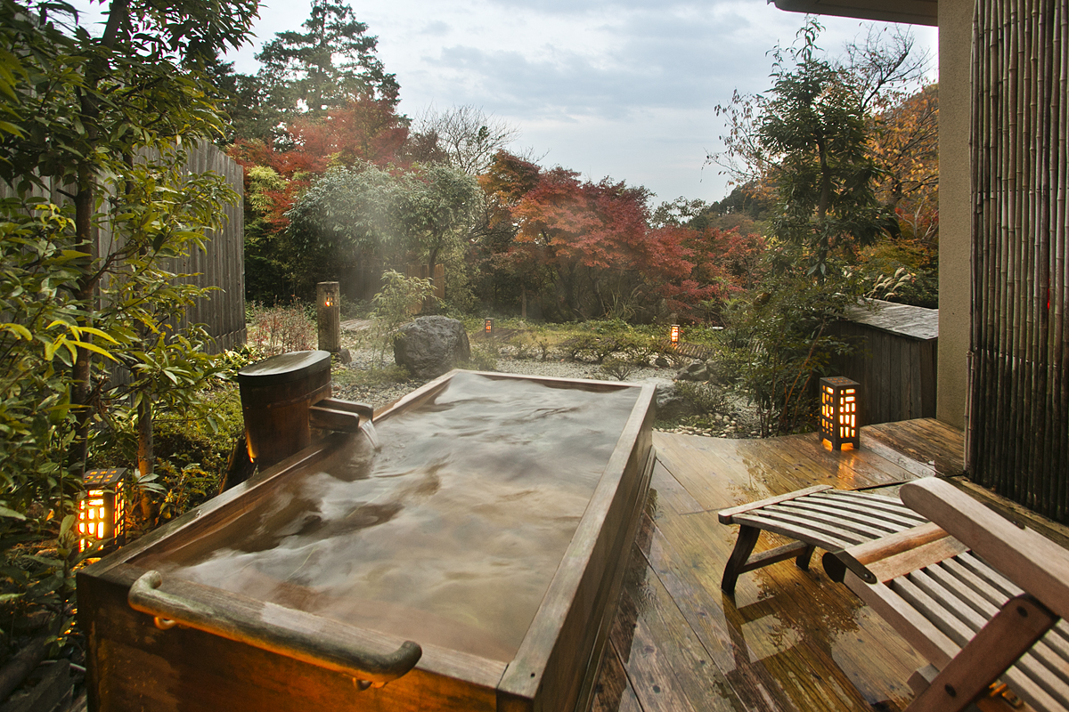 Private open-air natural hot spring bath in guest room Kazahana
